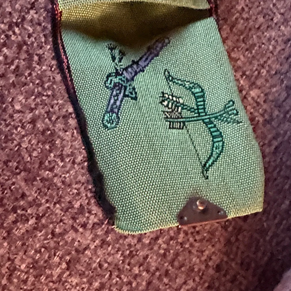 Green Embroidered Fabric Pouch for coins. Made in Japan. Recycled materials.
